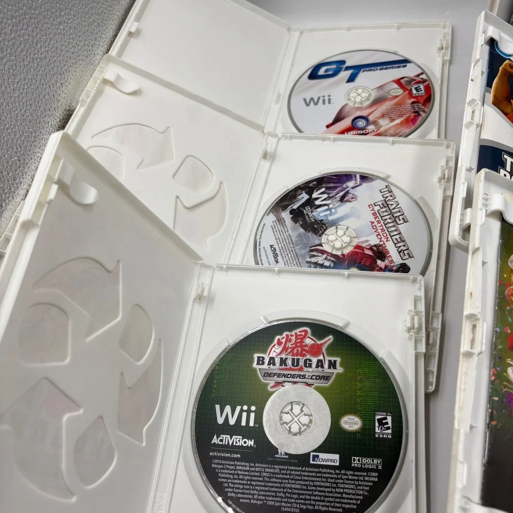 Nintendo Wii Games Bundle 6-Game Lot Various Good Bakugan Transformers Disney